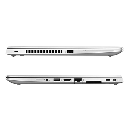 A silver laptop shown from the side in two views, displaying various ports and ventilation grilles on a plain white background.