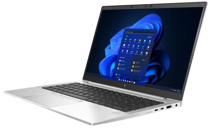A silver laptop with a black keyboard and screen, shown open at an angle against a solid white background. The screen displays a blue-themed Windows desktop.